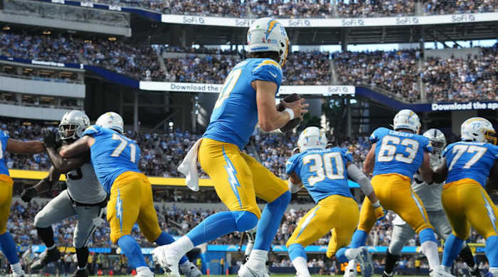 Sep 11, 2022; Inglewood, California, USA; Los Angeles Chargers quarterback Justin Herbert (10) drops back to pass against the Las Vegas Raiders in the second half at SoFi Stadium.